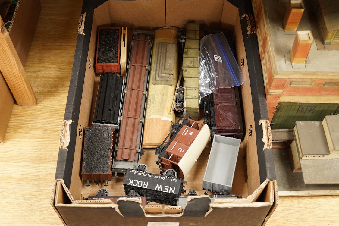 Eleven 0 gauge railway wooden freight wagons, wooden bodies and most possibly kit built using Bonds etc. parts, including a Leeds bogie mineral wagon, together with two kit or scratchbuilt wooden London Underground stati